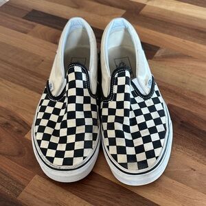 Vans Black and White Checkerboard Slip-On Sneakers